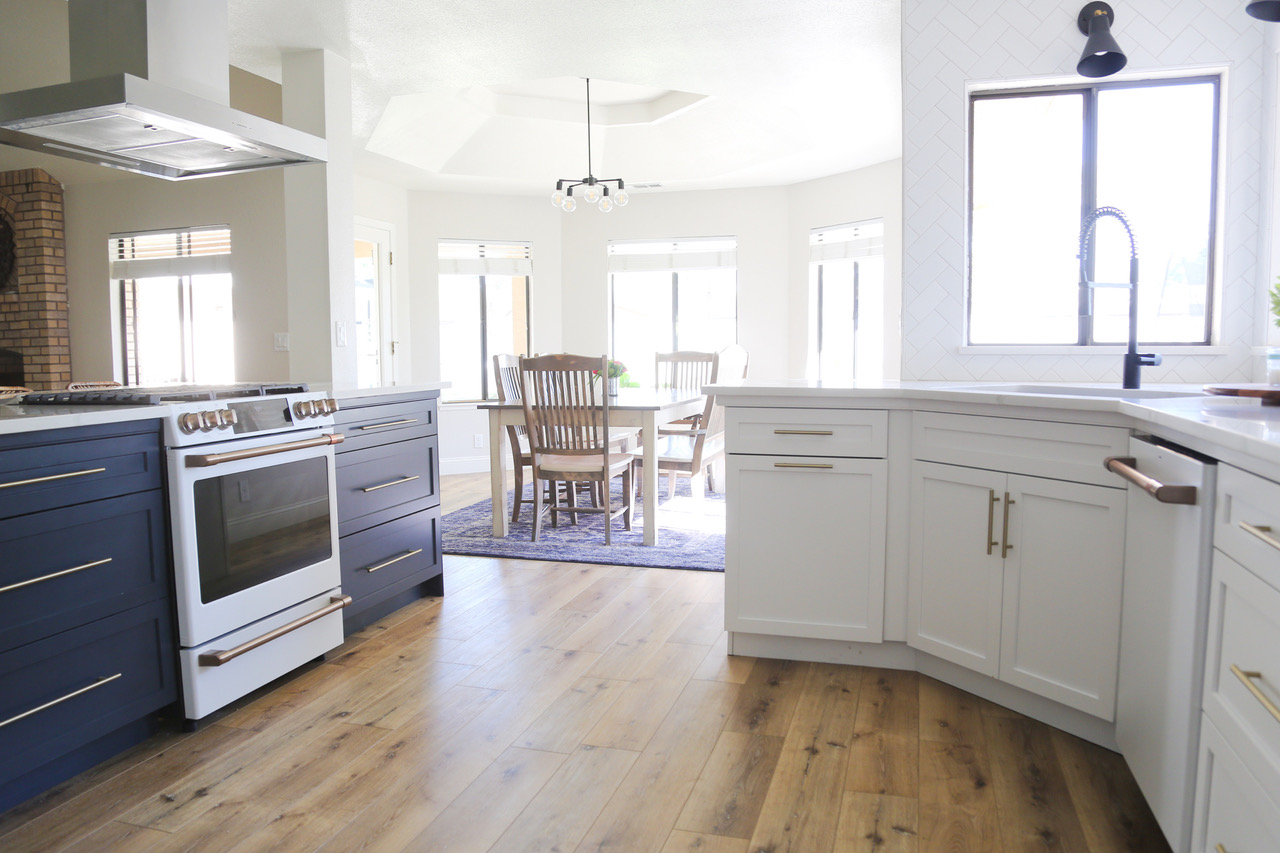 a white marble counter top in a kitchen