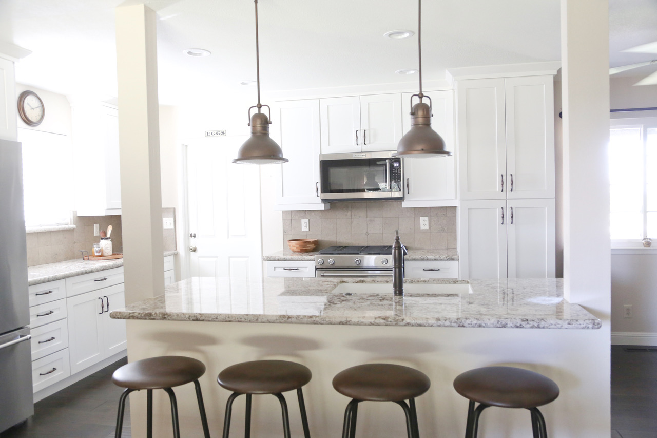 a marble countertop island bar