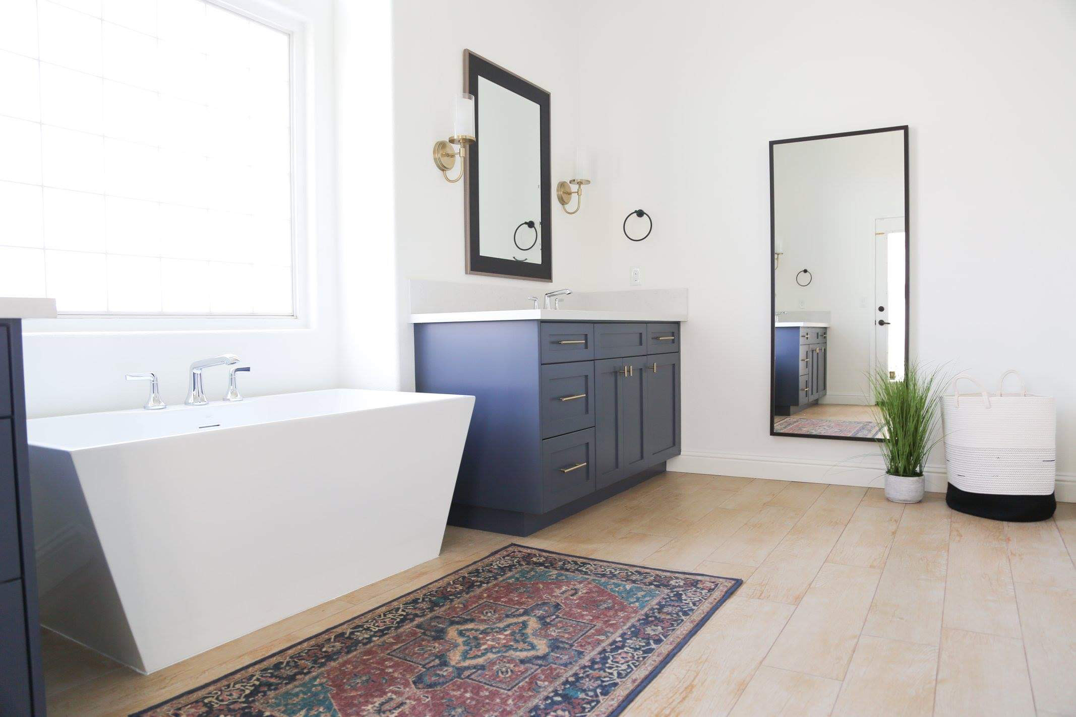 a bathroom sink white marble countertop