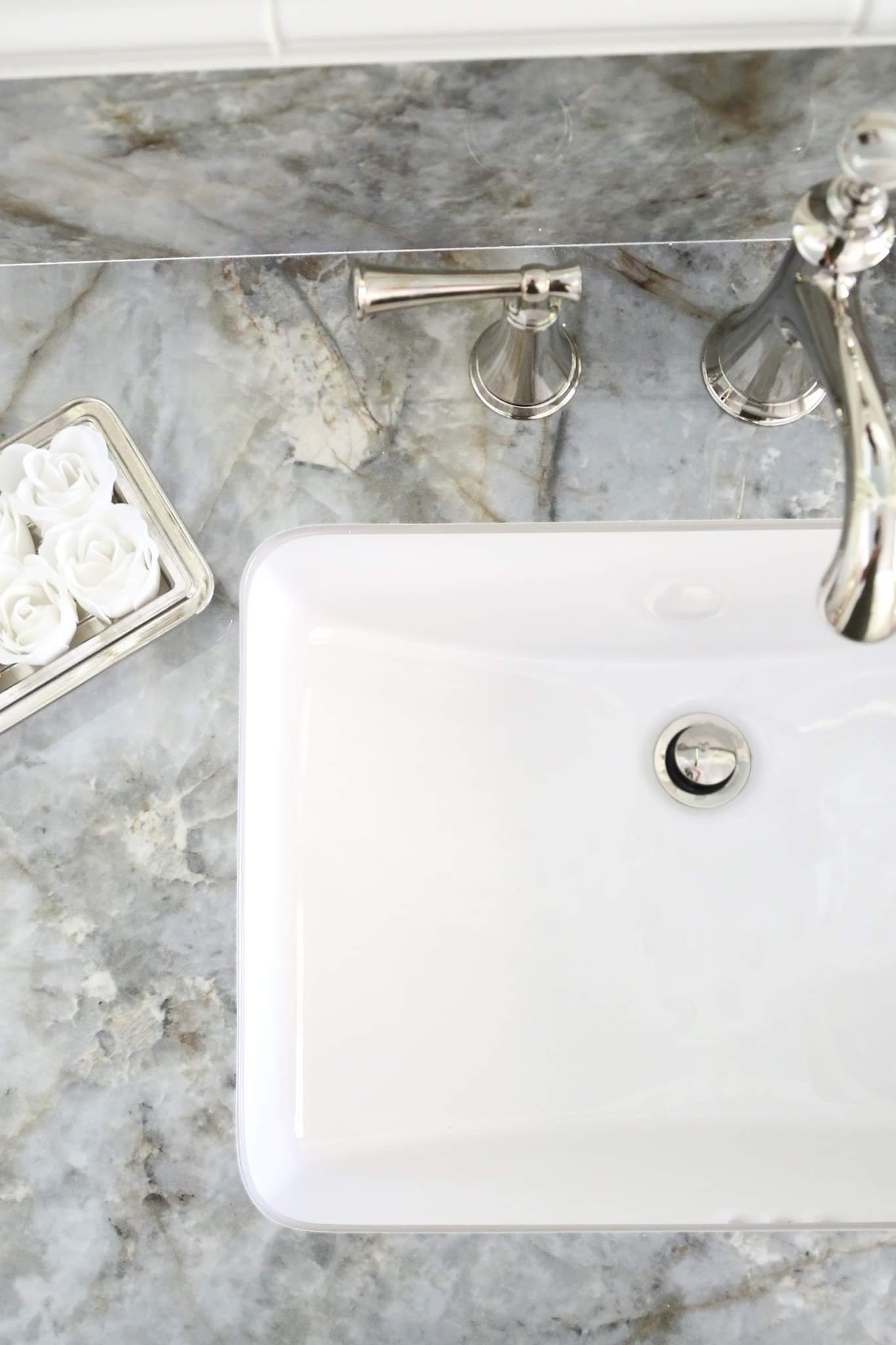 a marble sink in a bathroom